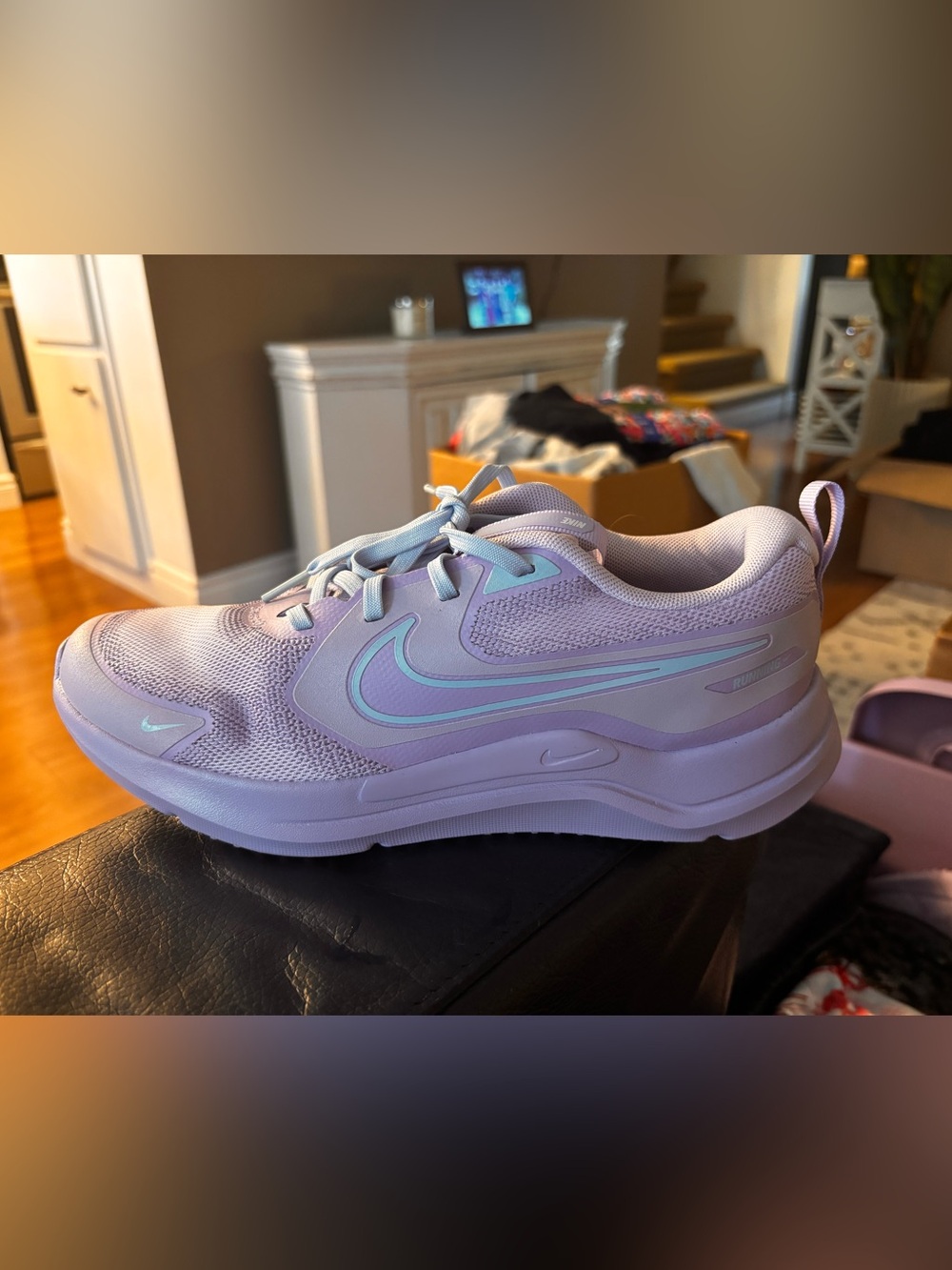 Nike Cosmic Runner sneakers in a pastel purple and blue colorway
